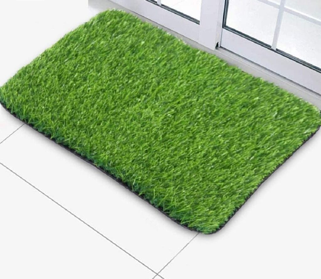 Sanushaa High Density Artificial Grass Door Mat, The carpet can be used indoors and outdoors both. It can be used as a carpet inside the house, for landscaping garden or for decorating the balcony. It looks 
